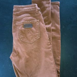 WRANGLER rust colored skinny jeans